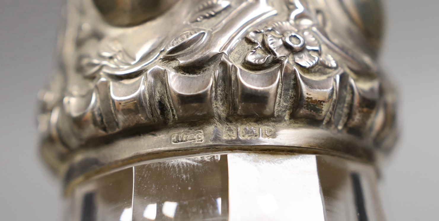 An Edwardian silver mounted cut glass claret jug, John Grinsell & Sons, Birmingham, 1902, 26cm.